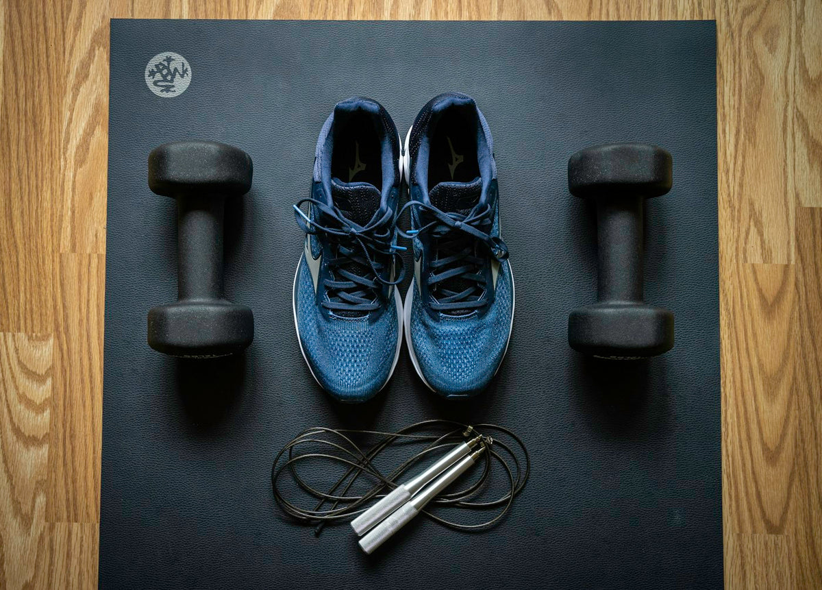 Trainers, dumbbells and a skipping rope