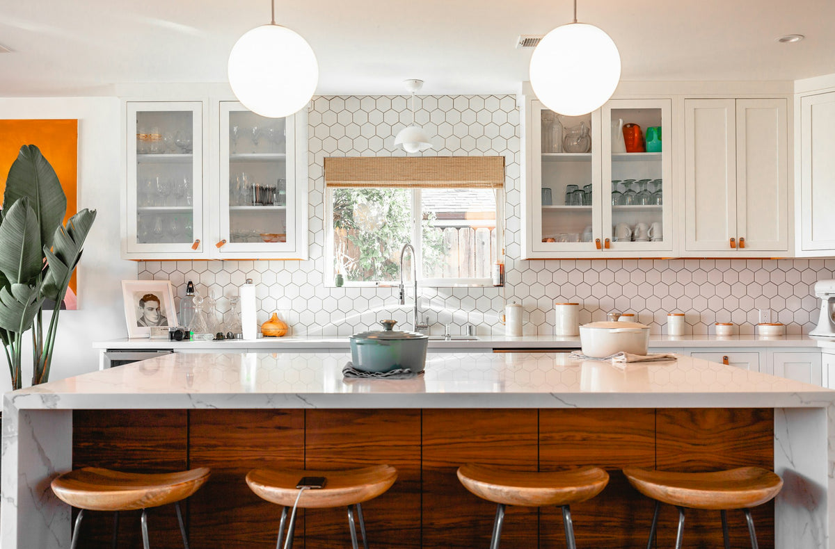 Bright modern kitchen with a clear marble island